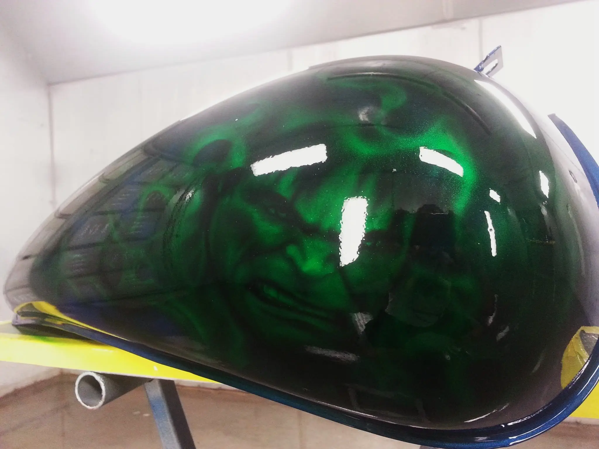 Custom painted vehicle part featuring a detailed Hulk face design in Eugene, OR